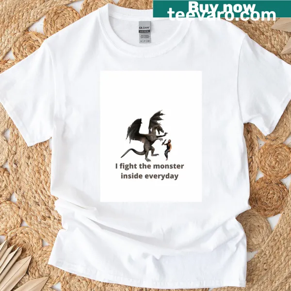 Bold text graphic about fighting inner monsters on a t-shirt