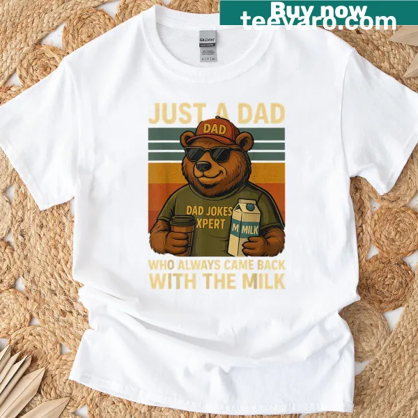 T-shirt featuring a humorous saying about dads and milk