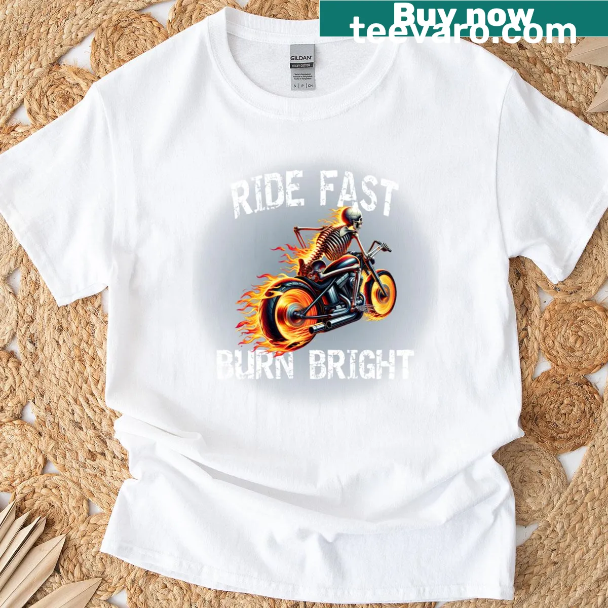 Skeleton biker graphic on a T-shirt with flames and bold text. — on a men's t-shirt