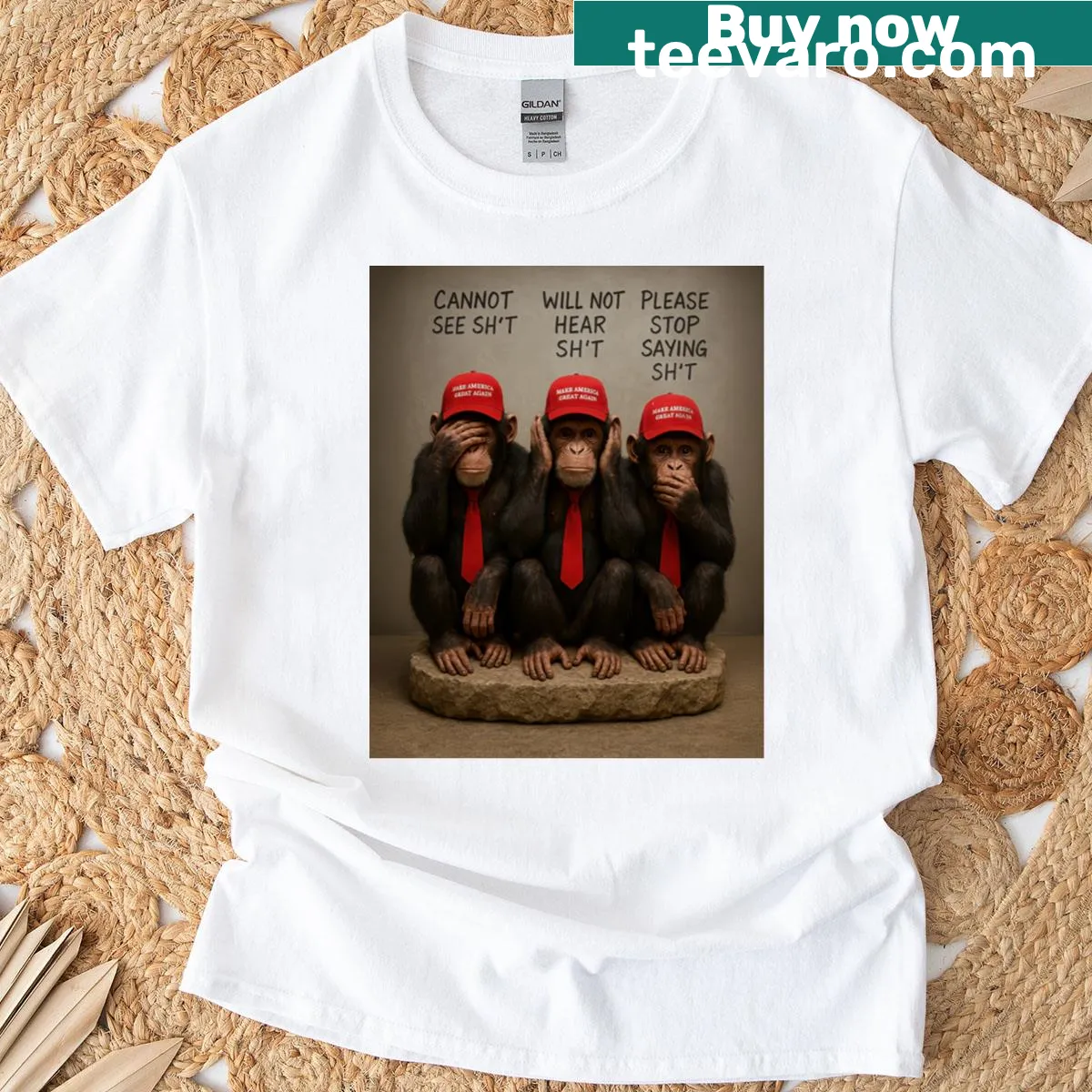 Cartoon monkeys depicting see no evil, hear no evil, speak no evil theme. — on a men's t-shirt