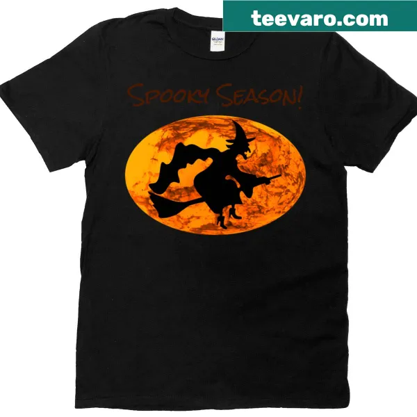 Witch riding a broomstick in a pumpkin sky illustration on a dark t-shirt