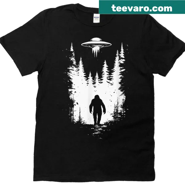 Funny T-shirt with UFO beaming up Bigfoot graphic