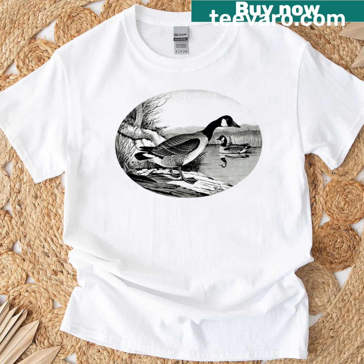 Funny Goose Whisperer t-shirt with cartoon goose illustration and humorous text — on a men's t-shirt
