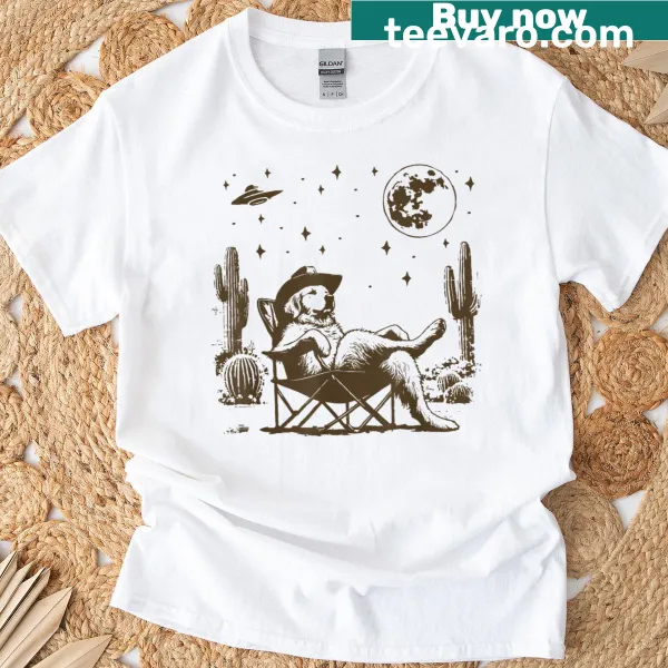 Vintage-style T-shirt featuring a cowboy golden retriever and UFO
