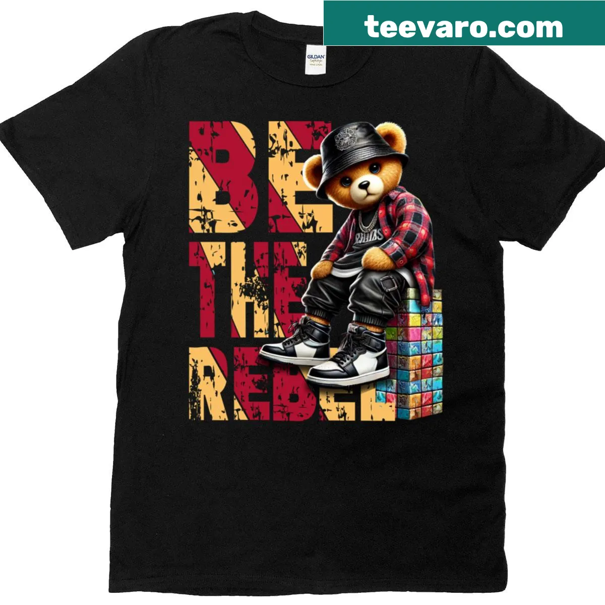 Bold text on t-shirt reading 'Be The Rebel' — on a men's t-shirt
