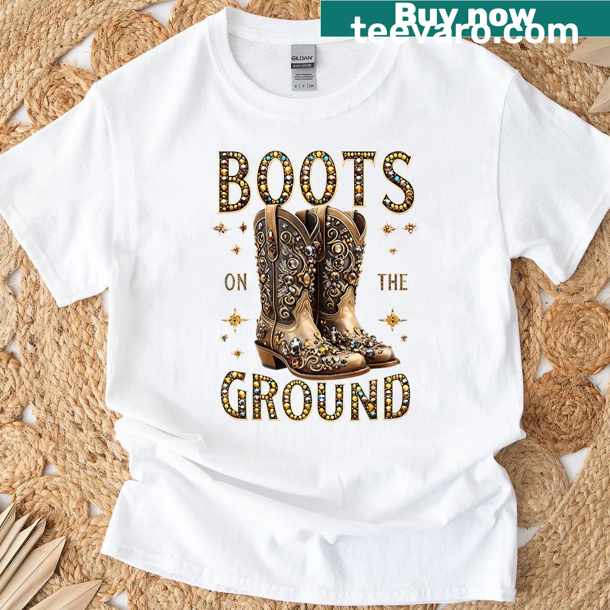 Badge-style emblem t-shirt celebrating cowgirls with Boots On The Ground — on a men's t-shirt