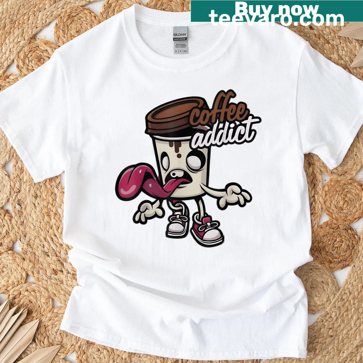 Cartoon coffee cup graphic with humorous text about coffee addiction — on a men's t-shirt