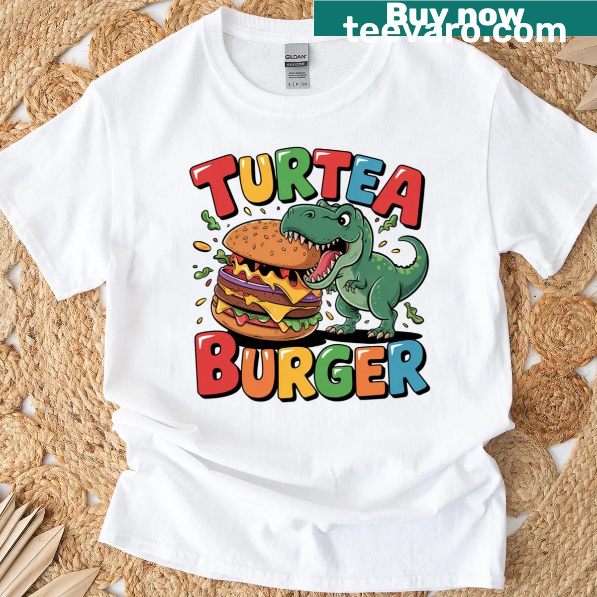 Cartoon dinosaur with a burger on T-shirt — on a men's t-shirt