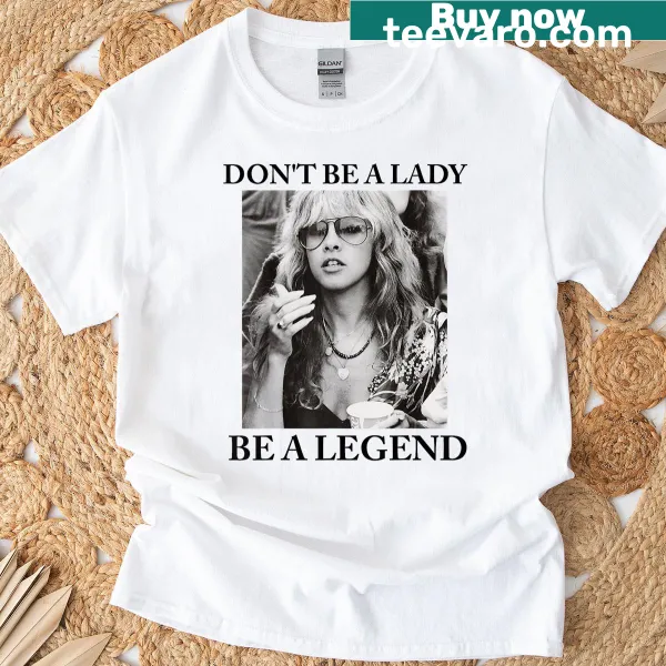 Hand-lettered design with the phrase 'Don't Be A Lady Be A Legend' on a t-shirt