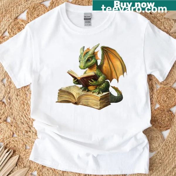 Cartoon dragon reading a book in a whimsical design on a t-shirt