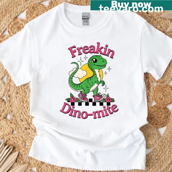 Cartoon art t-shirt featuring a cute dinosaur in pink sneakers.