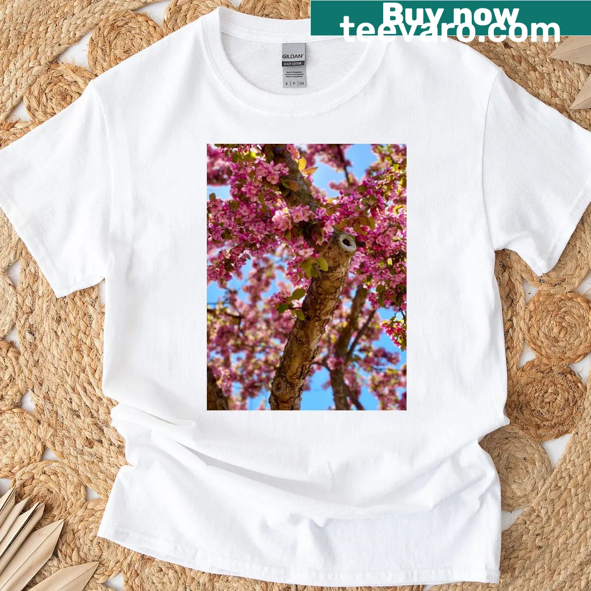 Minimalist t-shirt featuring an elegant sakura silhouette design. — on a men's t-shirt