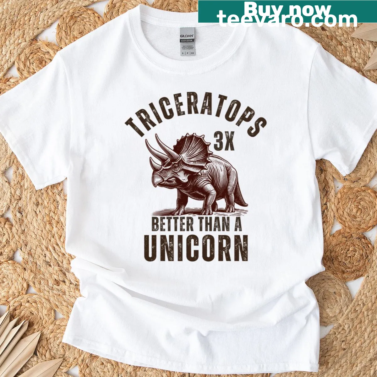 Triceratops graphic with text declaring it better than a unicorn on t-shirt — on a men's t-shirt