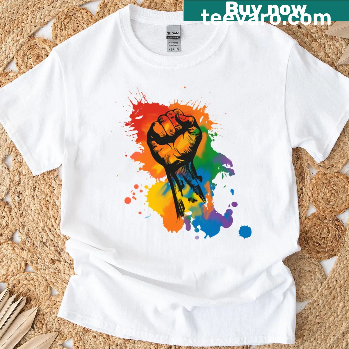 Pride Power Fist graphic T-shirt with a rainbow design — on a men's t-shirt