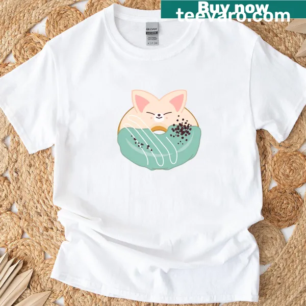 Foxiny enjoying a donut graphic on a playful t-shirt