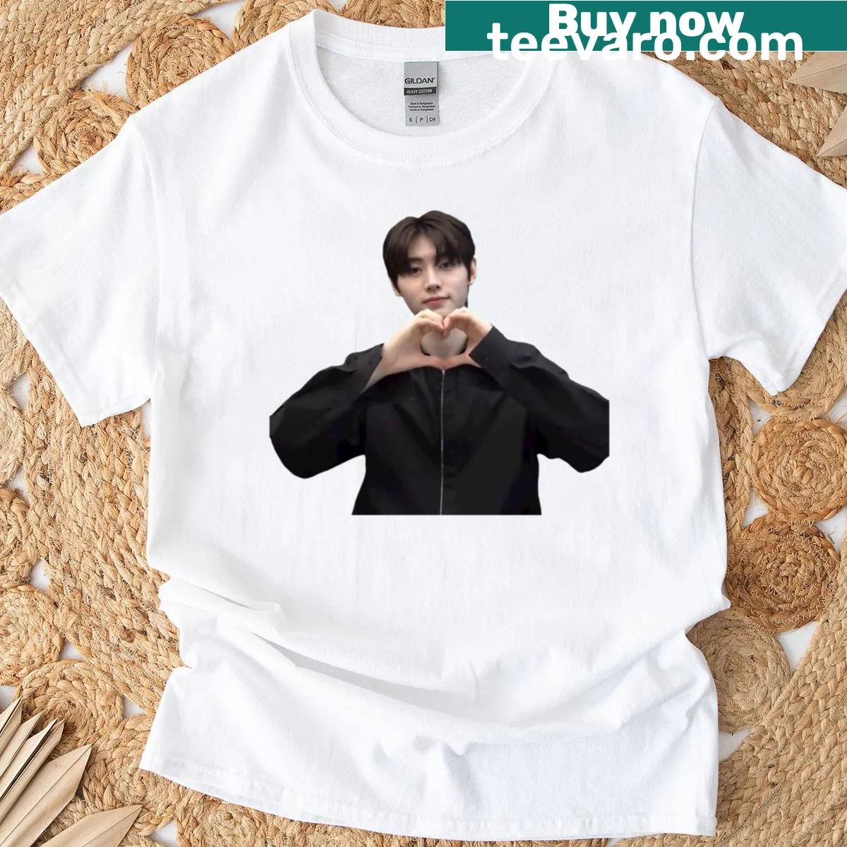 T-shirt featuring an illustration of Sunghoon from Enhypen making a hand heart — on a men's t-shirt