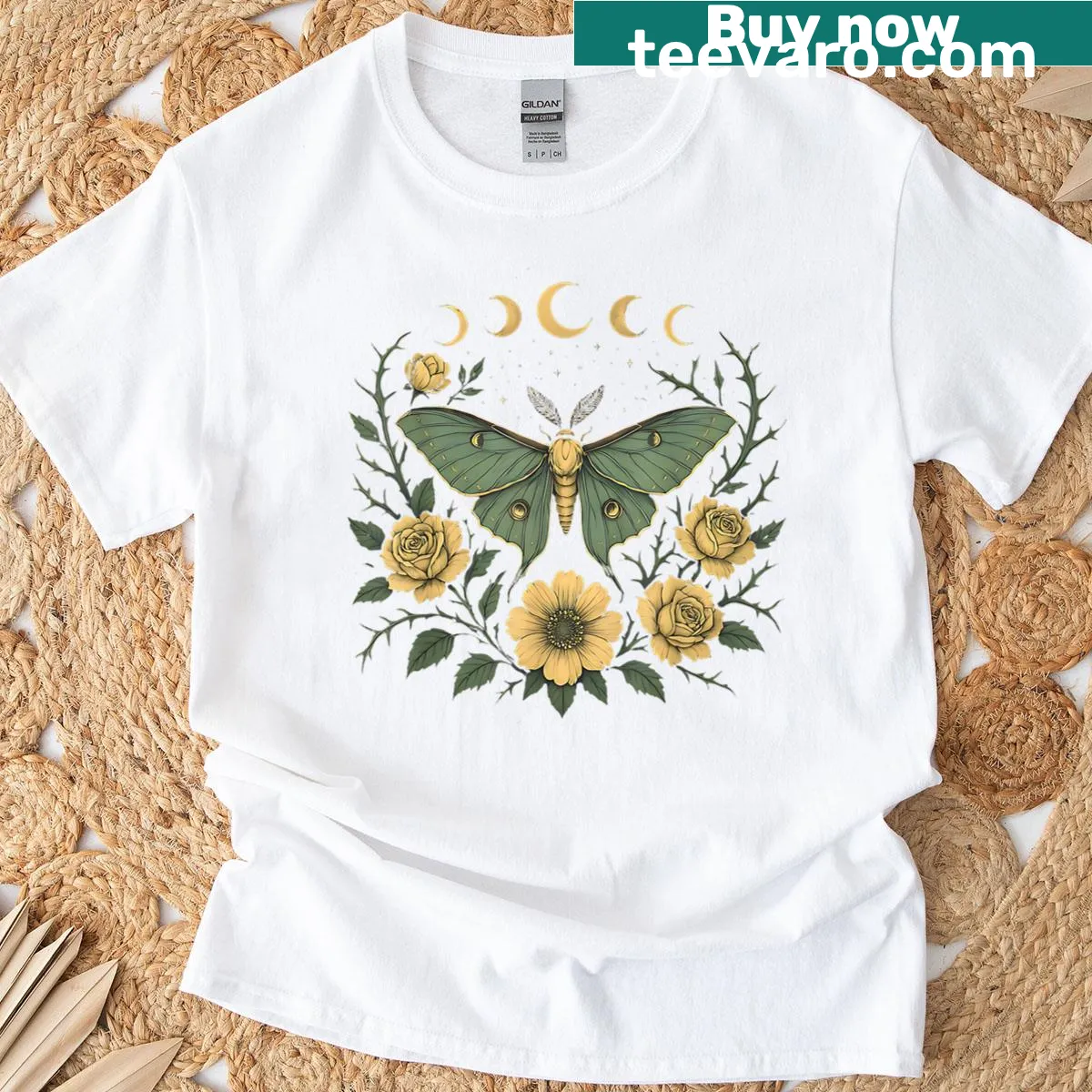 Whimsical illustrations of flowers, moths, and butterflies on t-shirt — on a men's t-shirt
