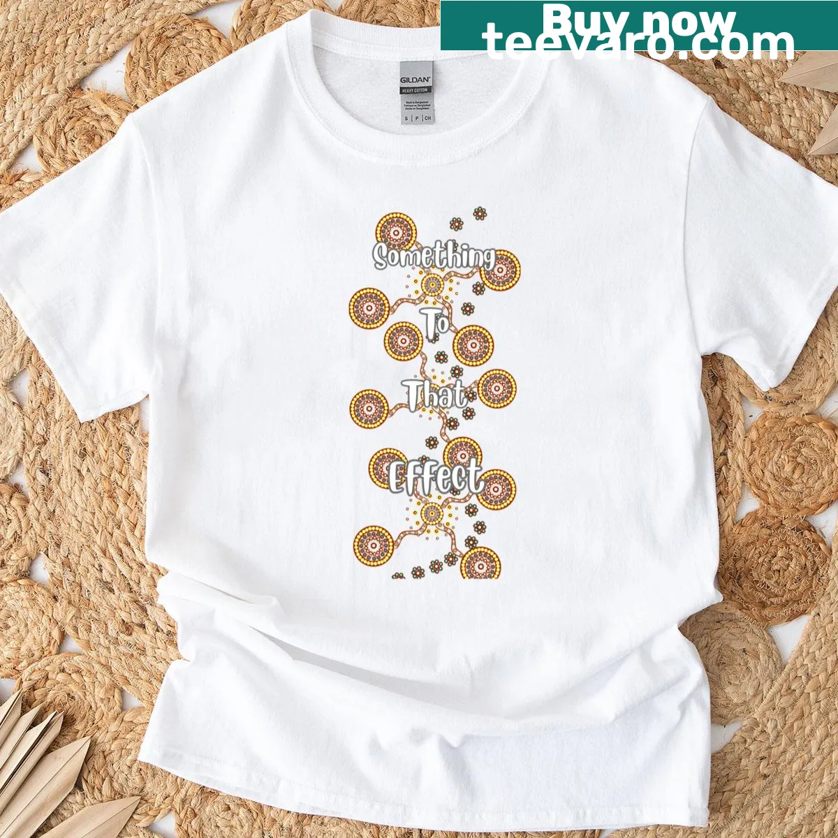 T-shirt featuring Indigenous dot painting design — on a men's t-shirt