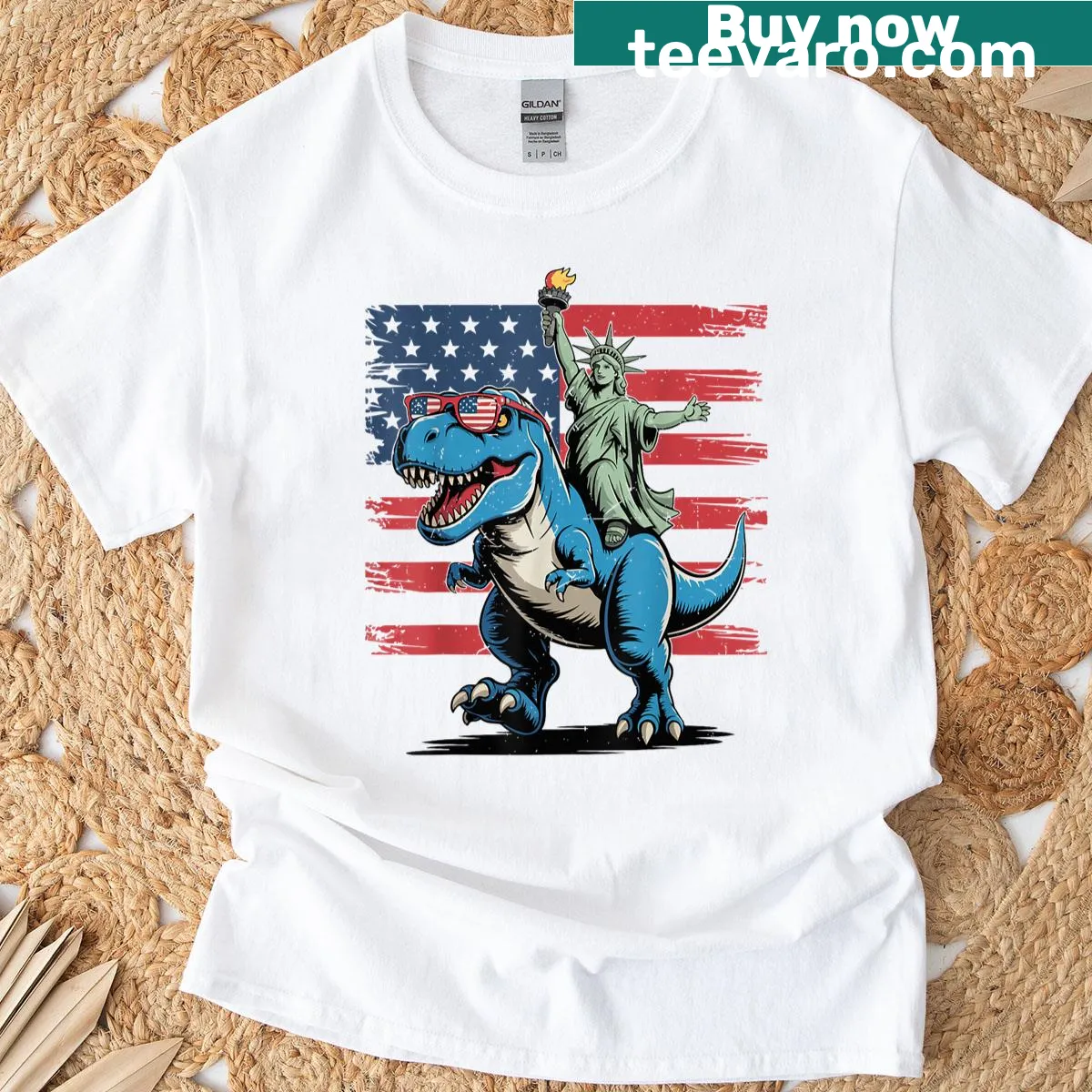 Toddler t-shirt featuring cartoon dinosaur as Statue of Liberty with USA flag — on a men's t-shirt