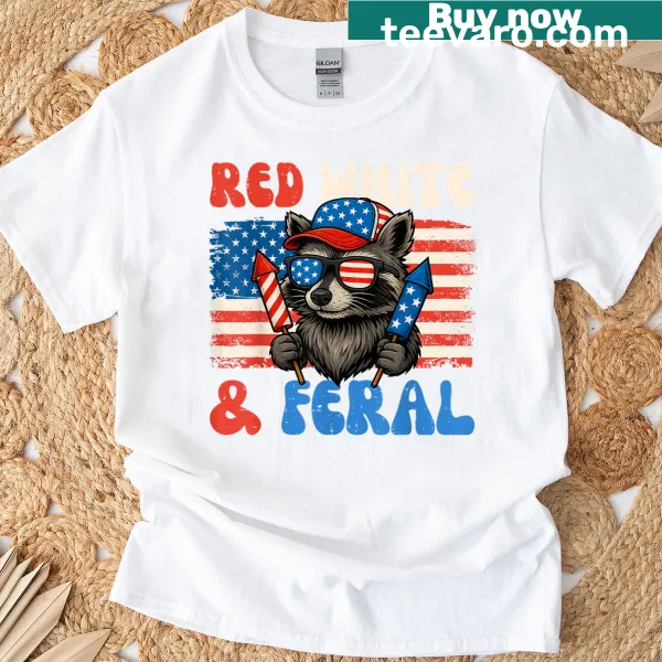 Funny raccoon-themed Fourth of July T-shirt with 'Red White Feral' text