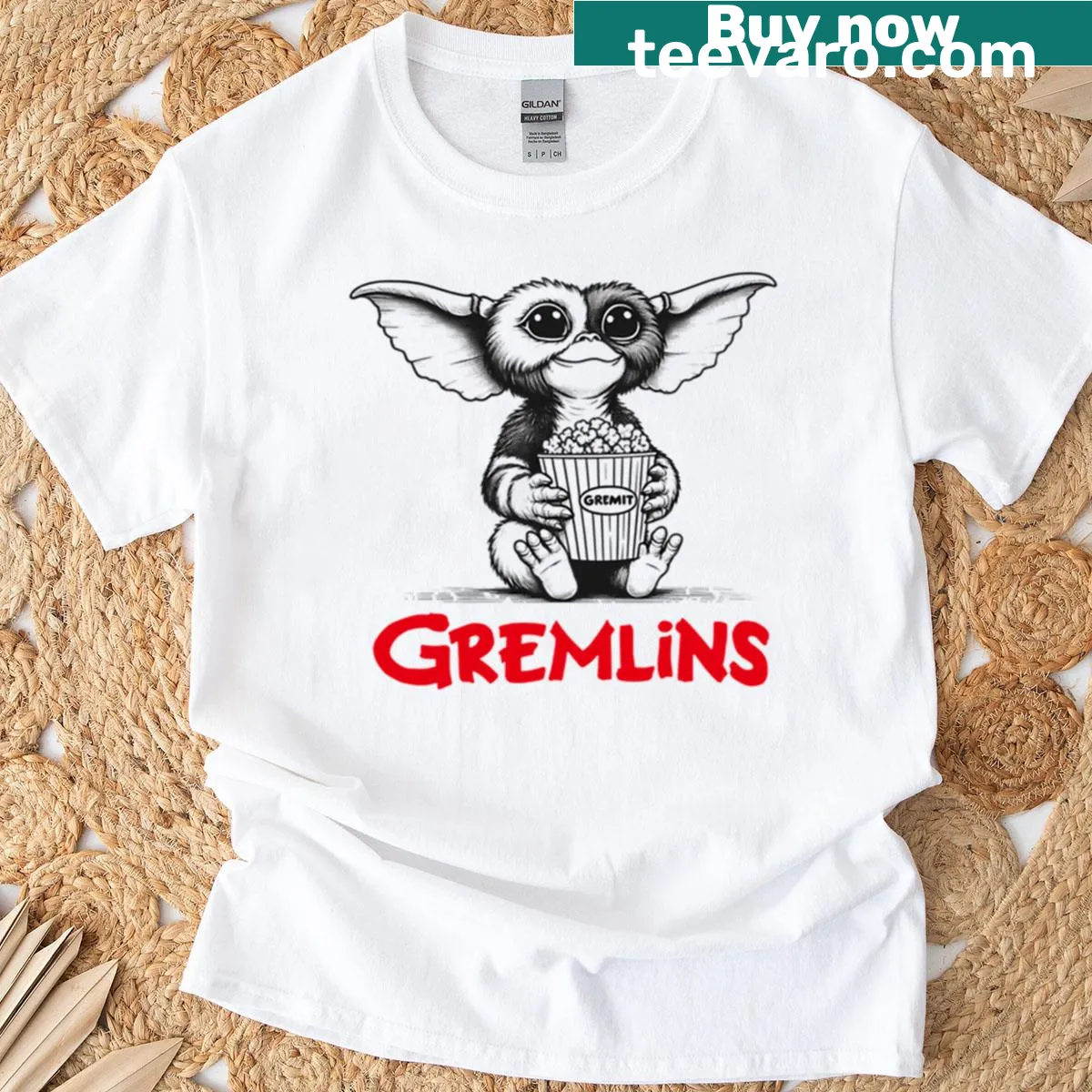 Oversized tee featuring Gizmo watching a movie with popcorn in a vintage style — on a men's t-shirt