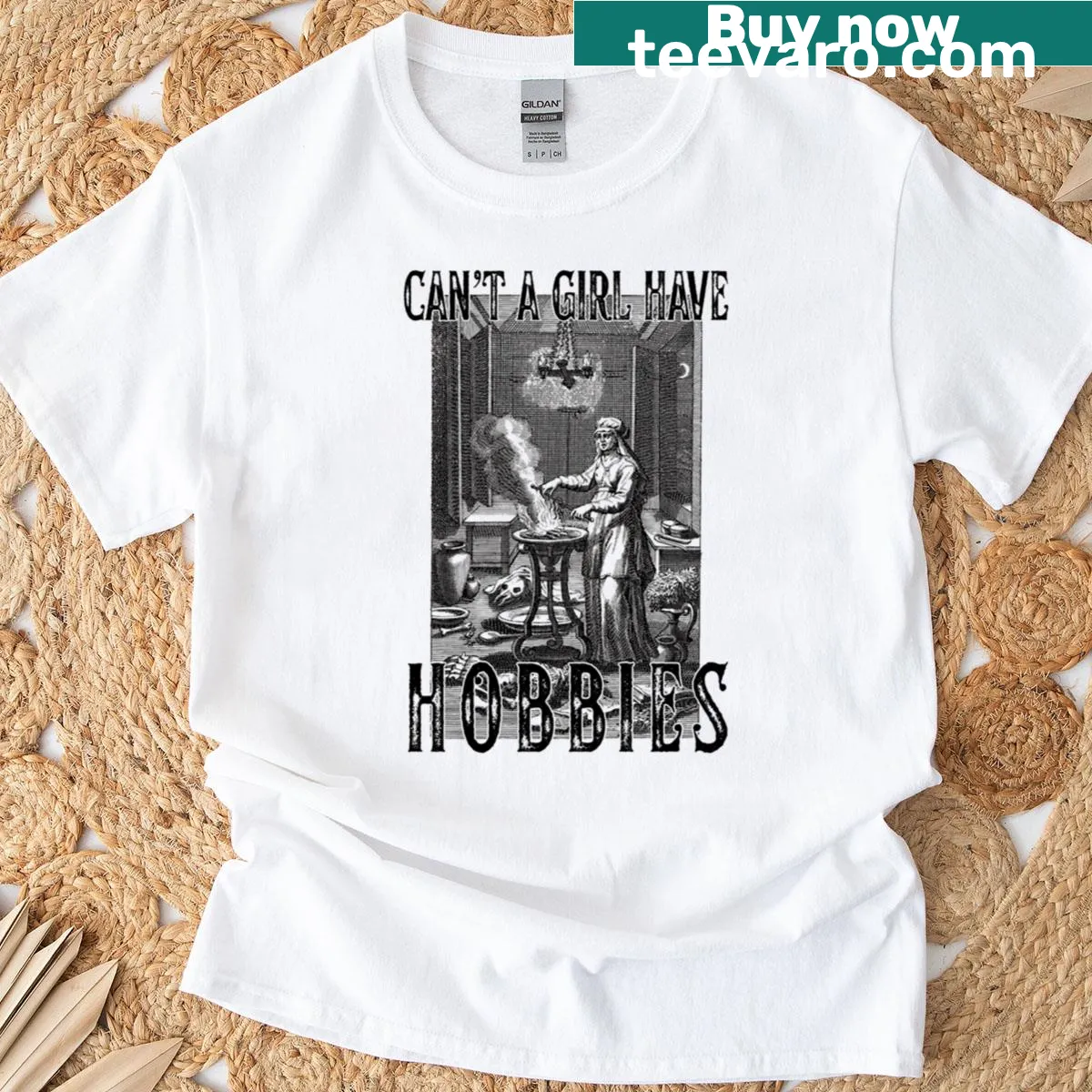 Whimsical typography on a T-shirt saying 'Can't A Girl Have Hobbies?' — on a men's t-shirt