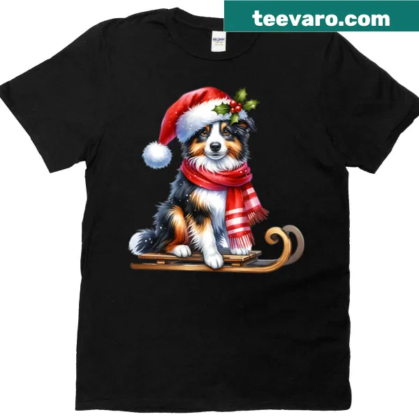 Christmas T-shirt featuring a Border Collie riding on a sled