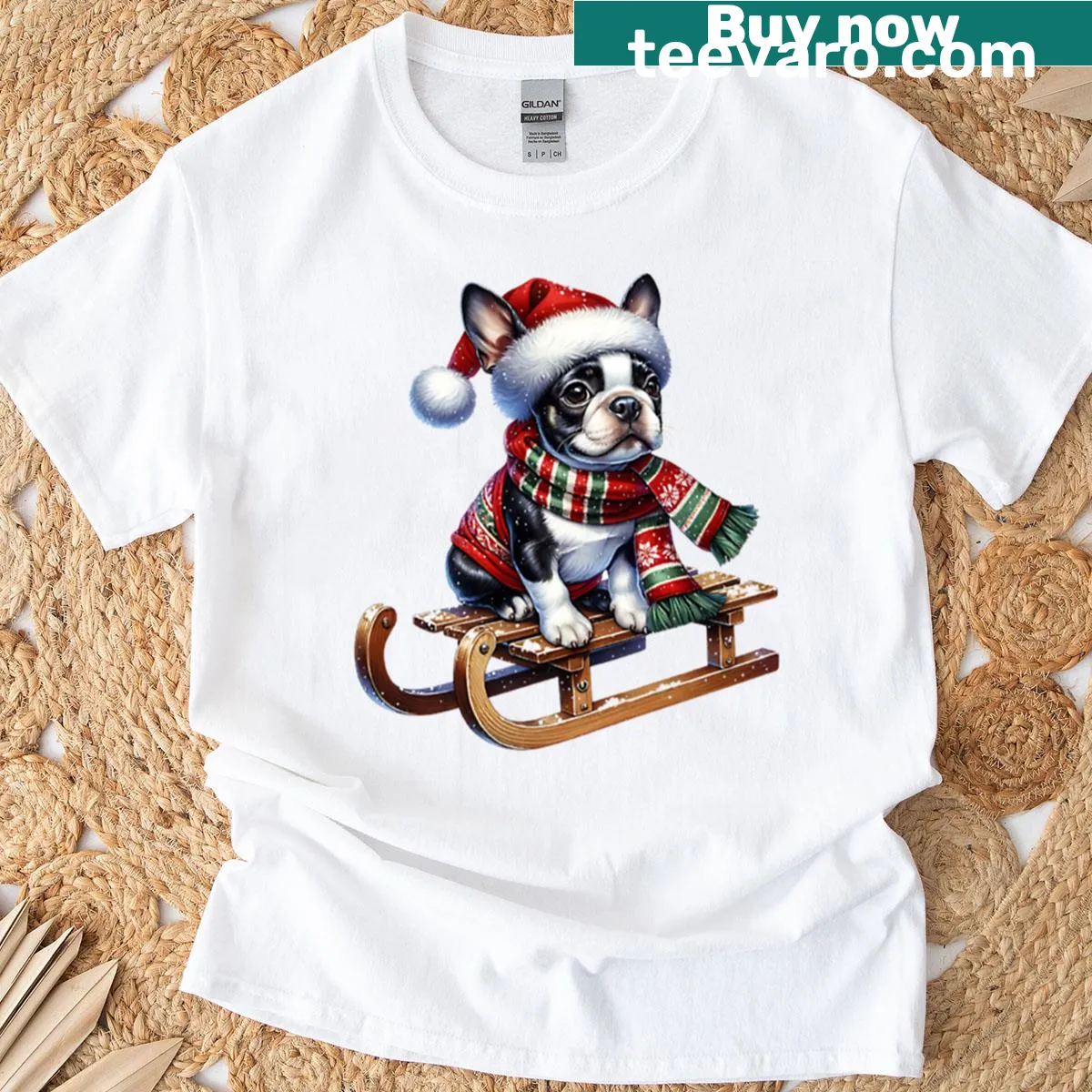 T-shirt depicting a Christmas Boston Terrier dog on a sled — on a men's t-shirt