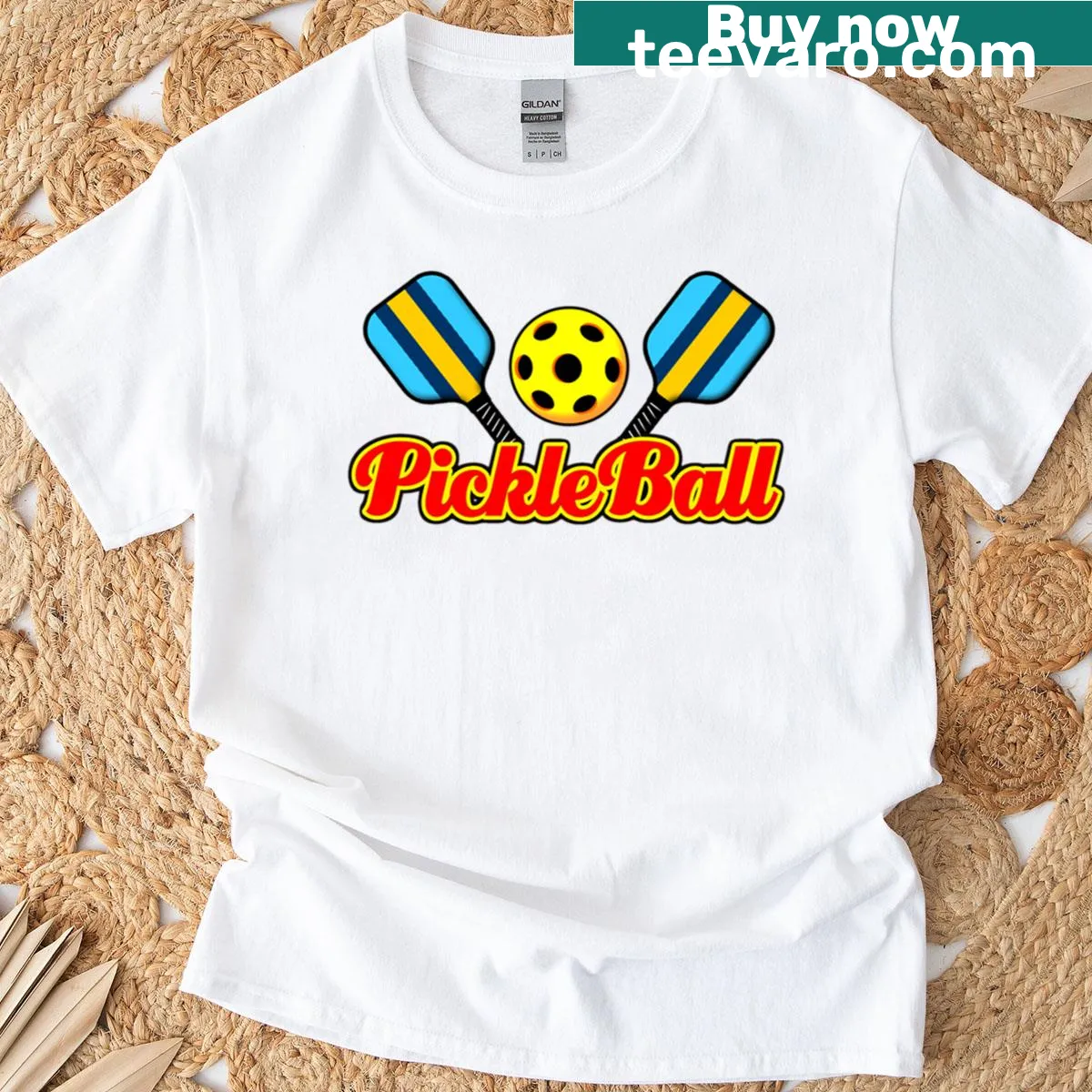 Playful pickleball graphic logo on an oversized t-shirt — on a men's t-shirt