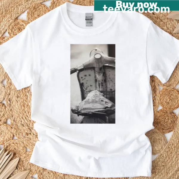 Vintage-style T-shirt featuring a black and white scooter graphic