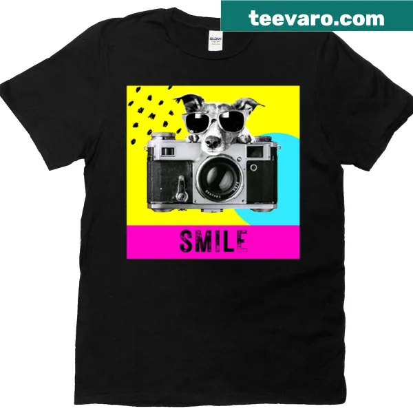 T-shirt featuring a smiling dog graphic and camera theme
