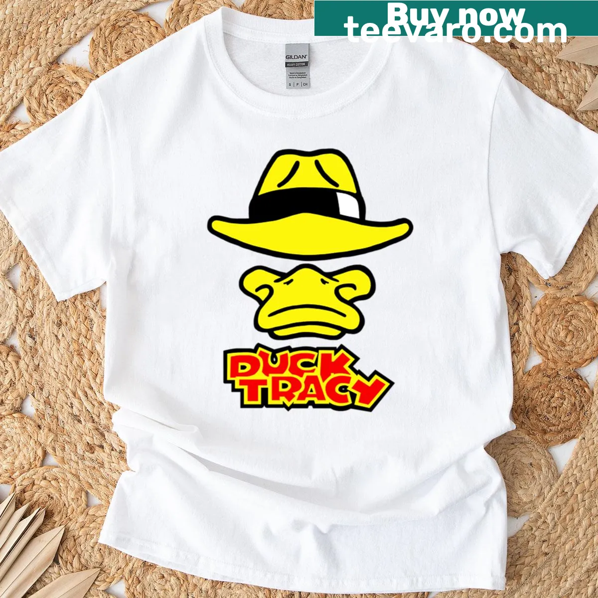 Illustrated T-shirt featuring a duck in a detective outfit — on a men's t-shirt