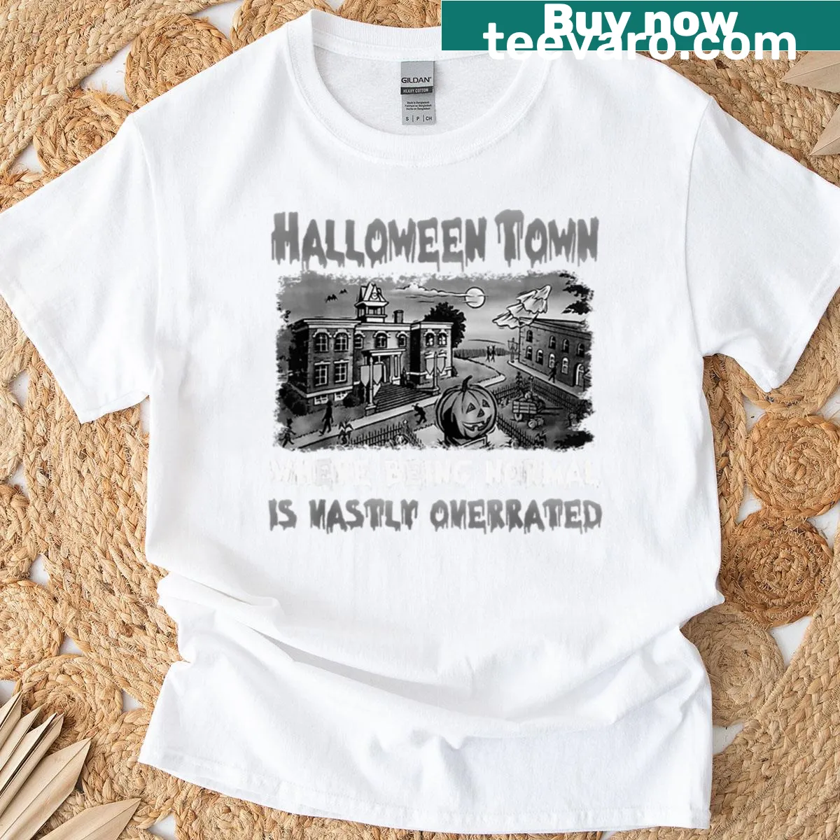 Black and white Halloween Town graphic T-shirt — on a men's t-shirt