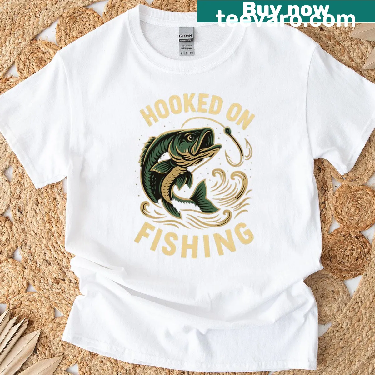 Playful graphic design saying Hooked On Fishing with fishing elements — on a men's t-shirt
