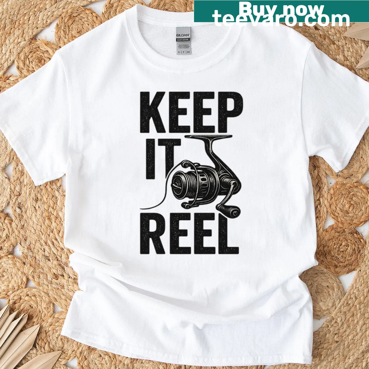 Vintage-style fishing shirt with 'Keep It Reel' quote design — on a men's t-shirt