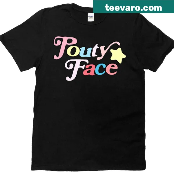 Whimsical t-shirt with a pouty face and rainbow design