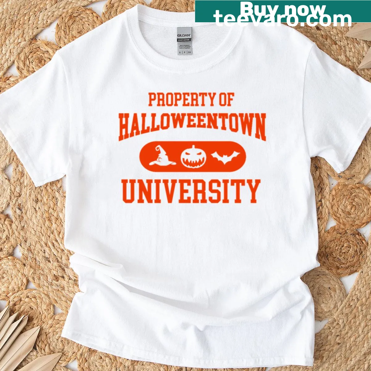 Text 'Property Of Halloweentown University' on a Halloween-themed t-shirt. — on a men's t-shirt