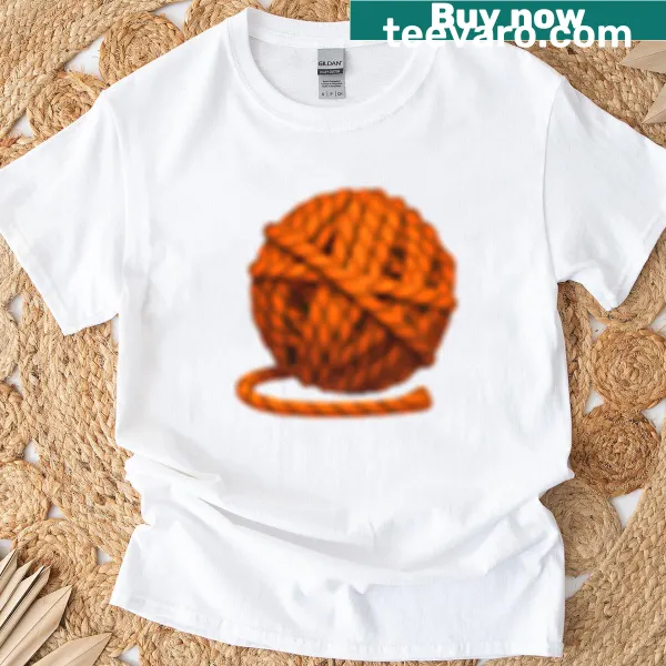 Playful yarn emoji t-shirt celebrating knitting and crafting.
