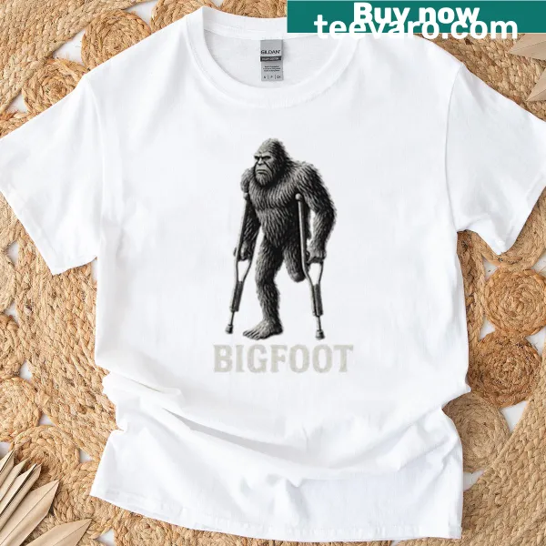 Bigfoot illustration on crutches on a humorous T-shirt