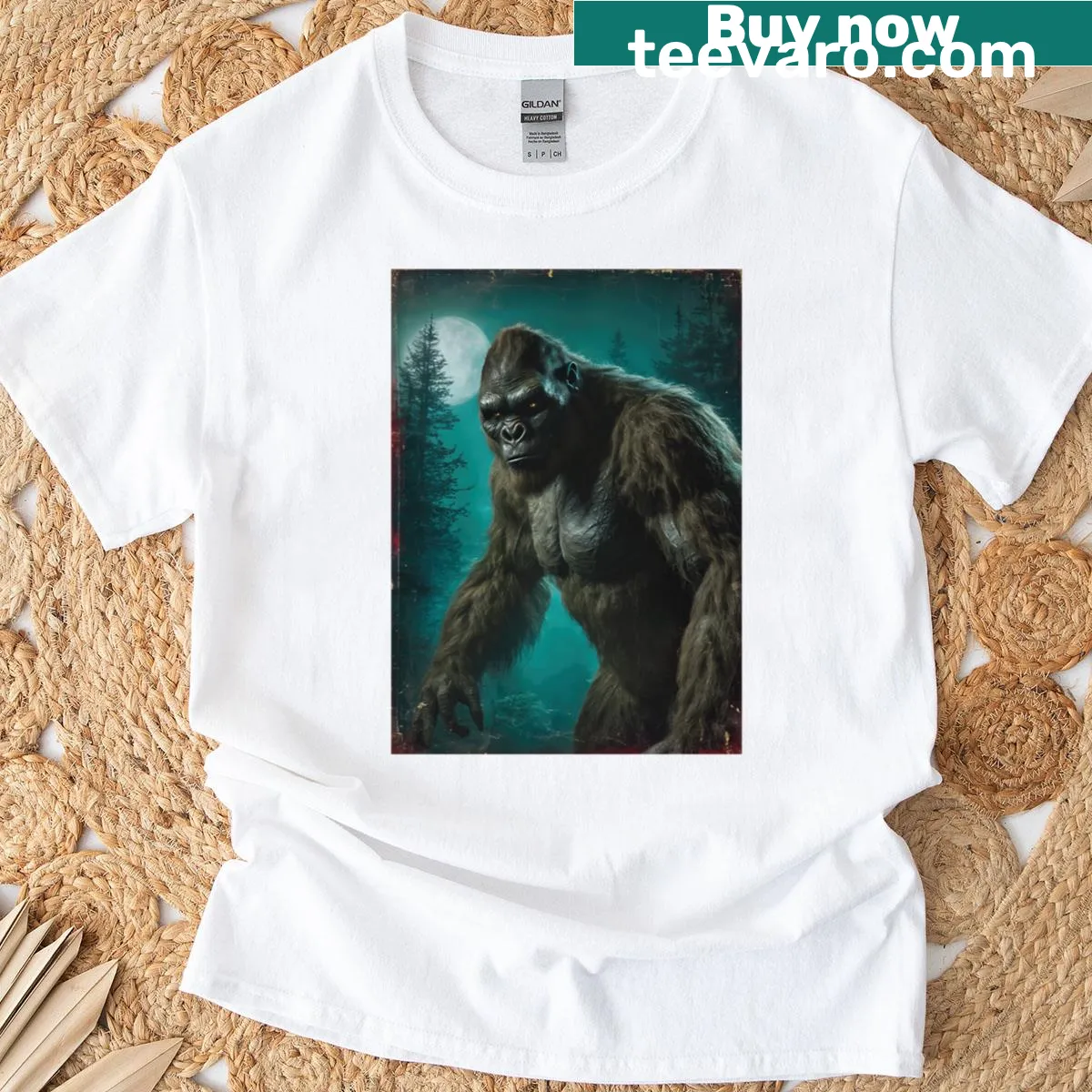 Bigfoot emerging from the forest under a full moon illustration — on a men's t-shirt