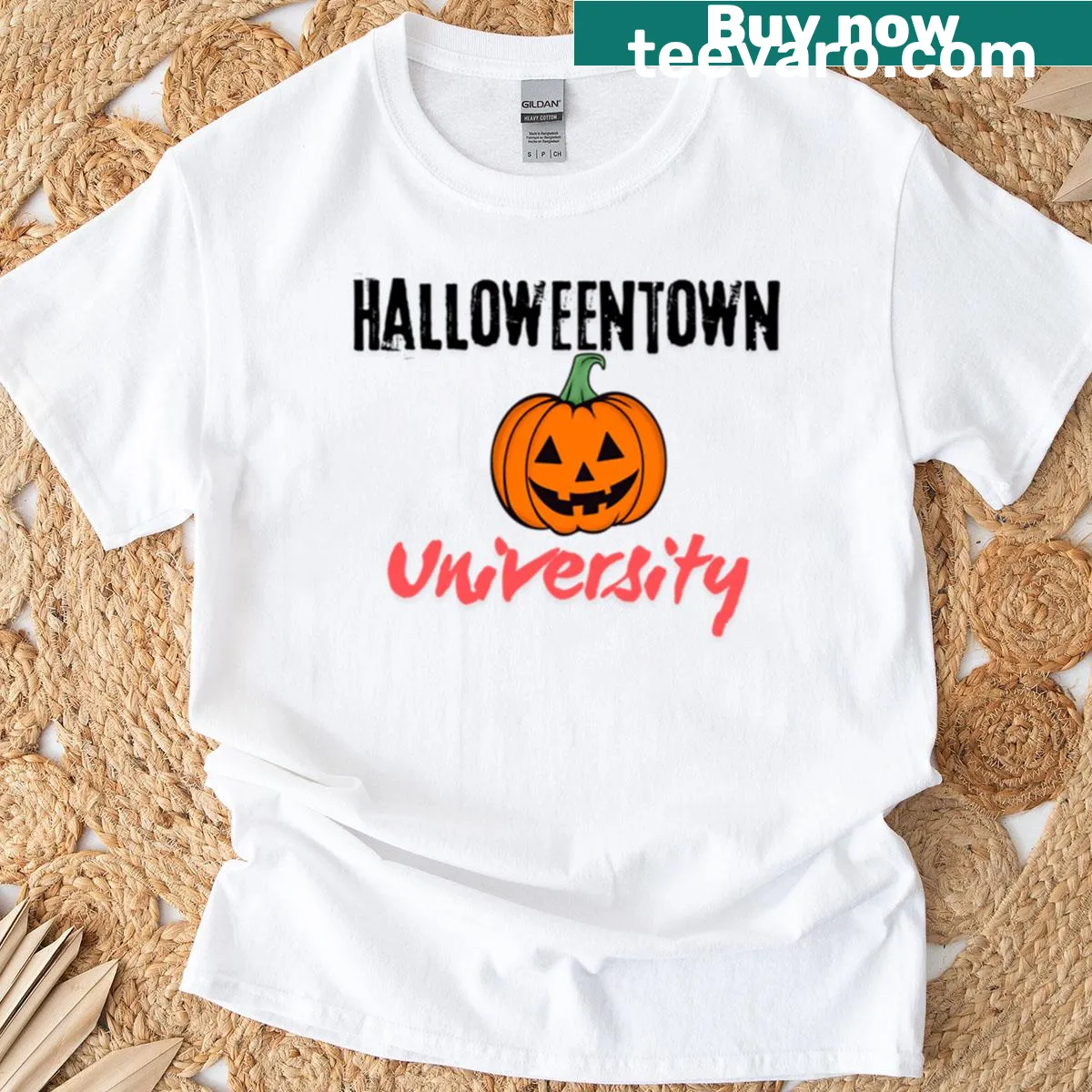 T-shirt featuring a badge design for Halloween Town University — on a men's t-shirt
