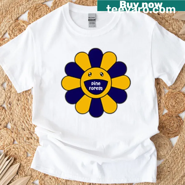 Nature-themed T-shirt with pine forest and floral elements design.