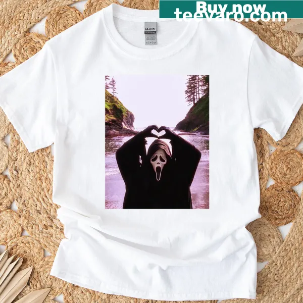 Ghostface design with heart hands on a vintage tee