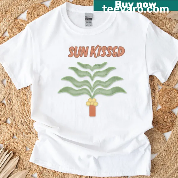 Tropical-themed T-shirt featuring wavy leaves and plants.