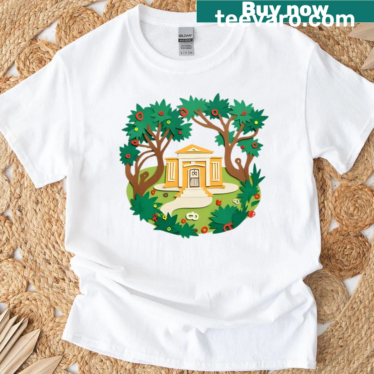 Illustrated papercut cottage surrounded by nature — on a men's t-shirt