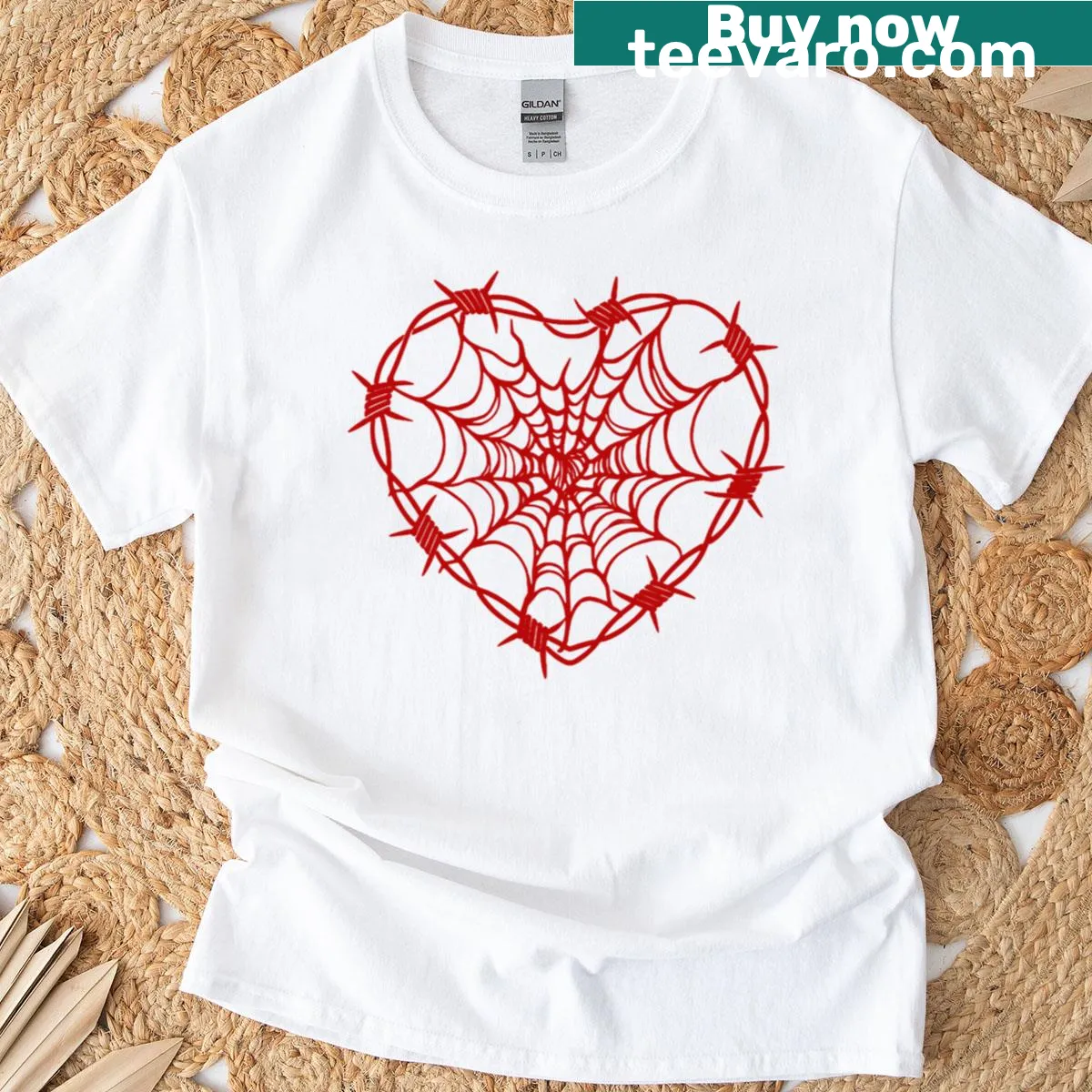 Edgy T-shirt with a red heart and barbed wire graphic — on a men's t-shirt