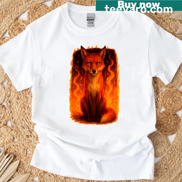 Artistic depiction of a fox in flames on T-shirt.