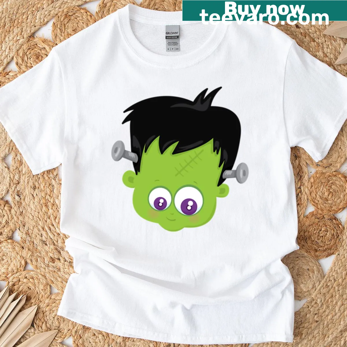 Cute cartoon T-shirt featuring a baby Frankenstein head illustration. — on a men's t-shirt