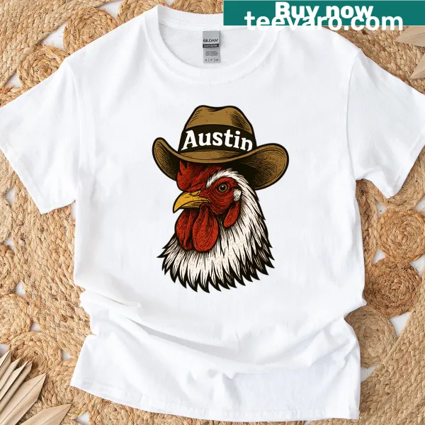 Humorous T-shirt featuring a chicken with a cowboy hat.