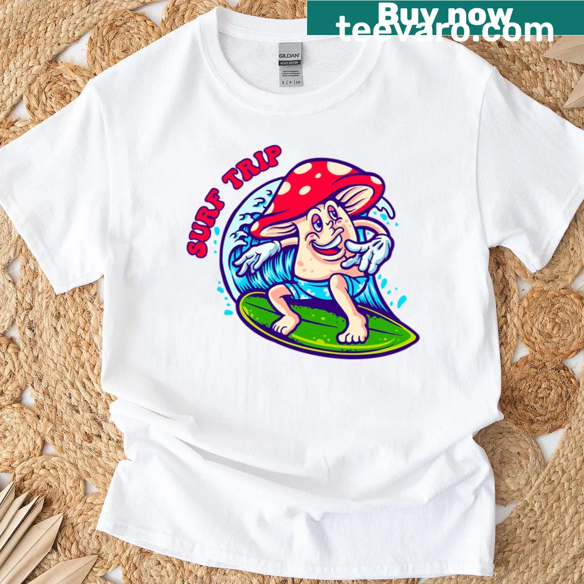 Playful T-shirt with a magic mushroom surfing a big wave. — on a men's t-shirt